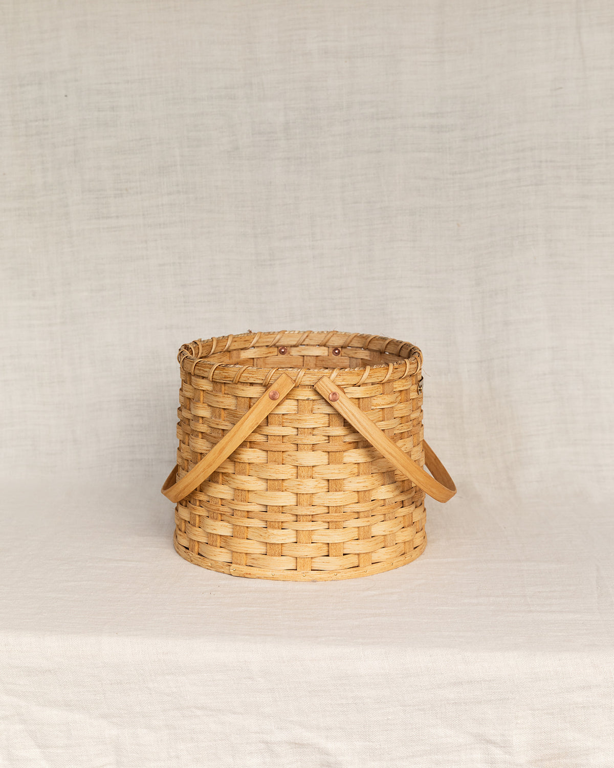 The Round Carrying Basket with Wooden Handles