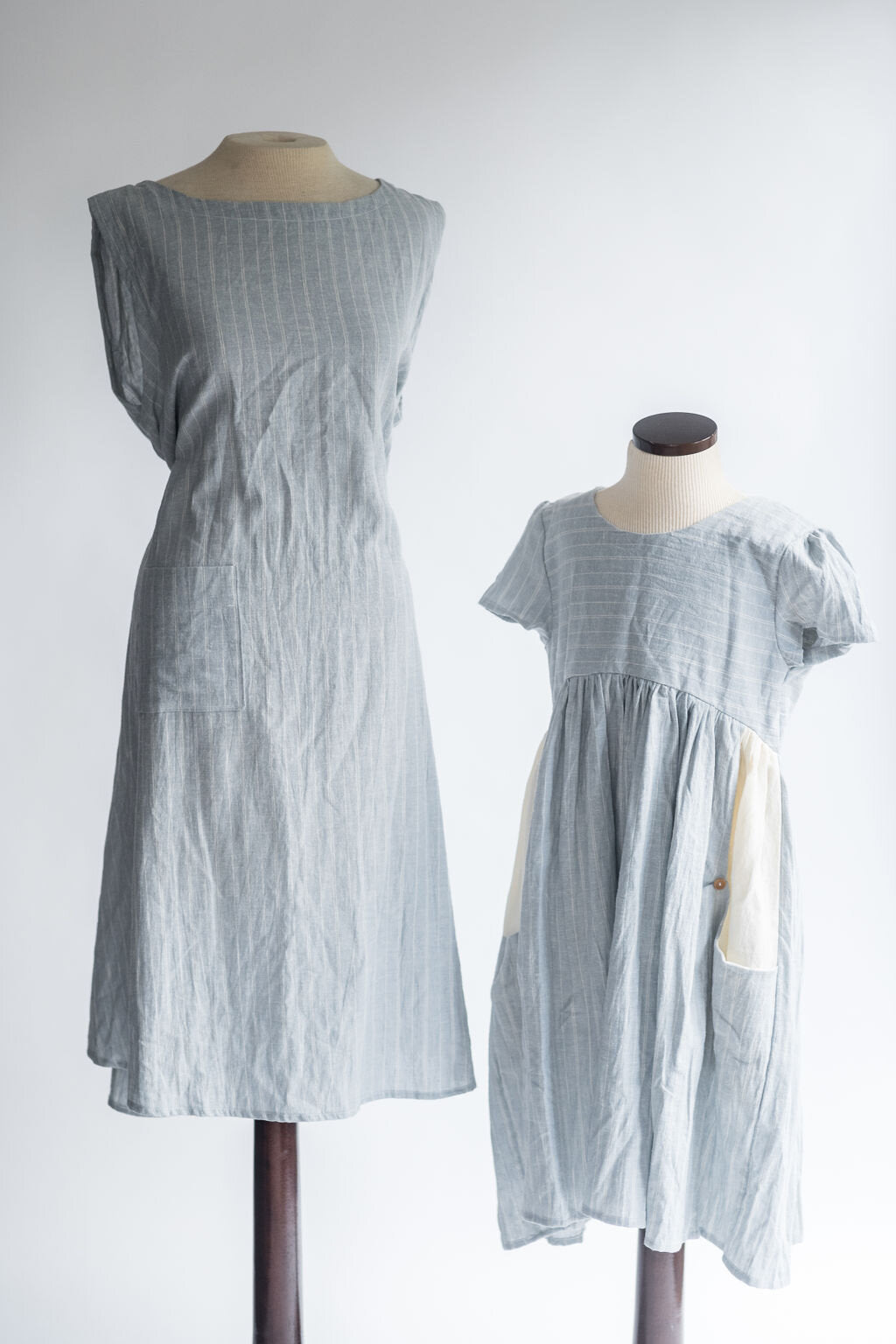 The Children's Linen Dress on a Mannequin