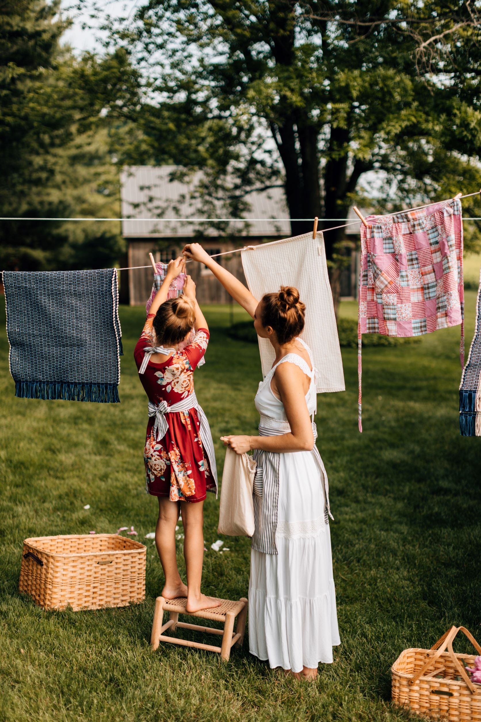 The Child's Quilted Patchwork Apron Hanging on a Clothesline