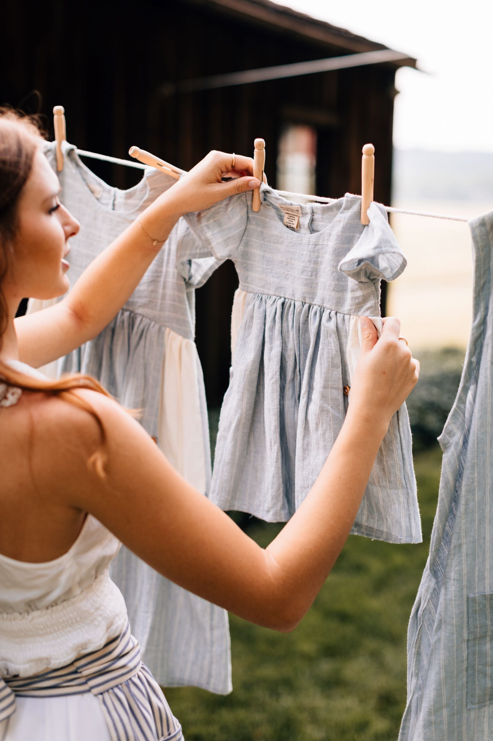 The Children's Linen Dress on a Clothesline