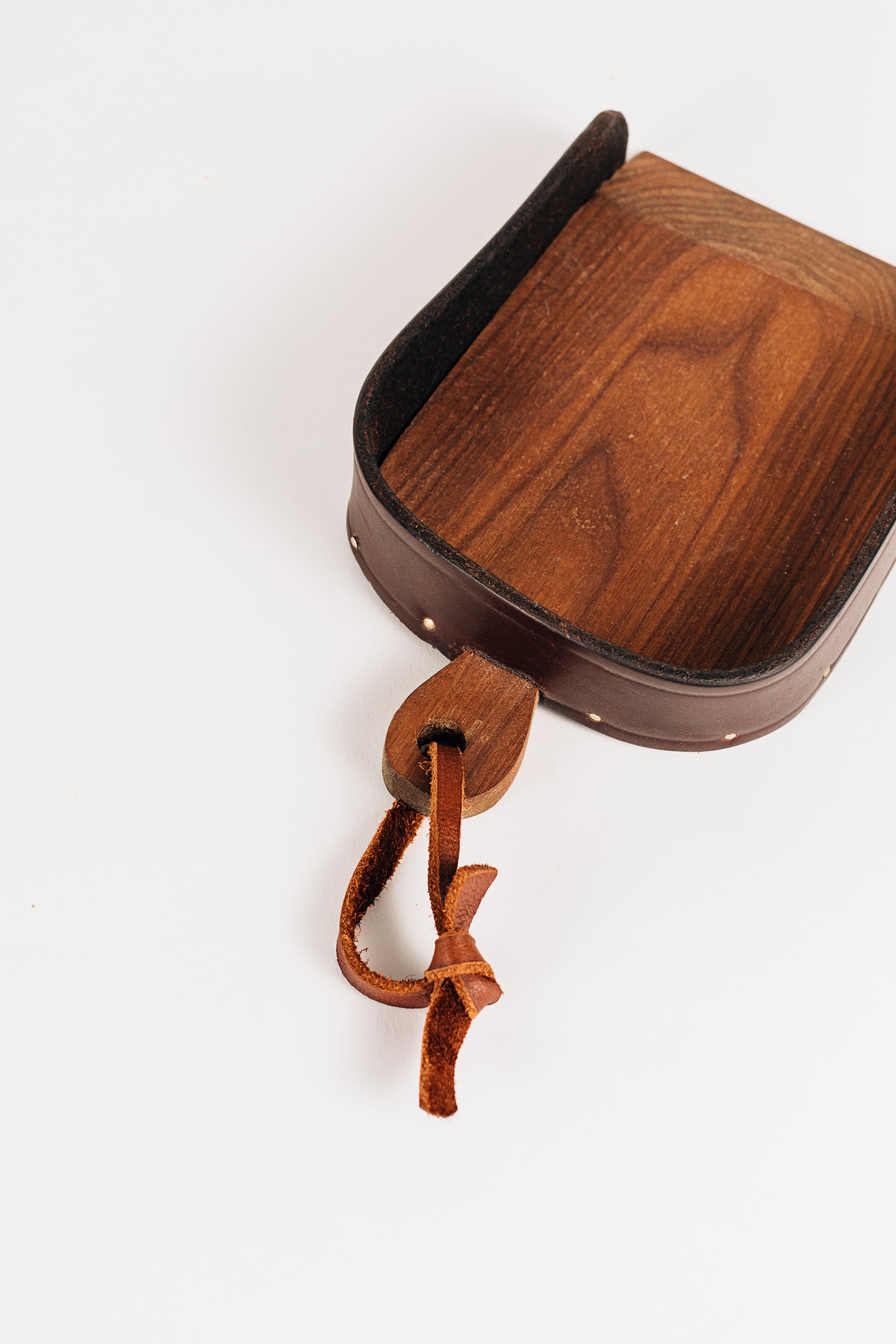 The Child's Leather and Wood Dustpan